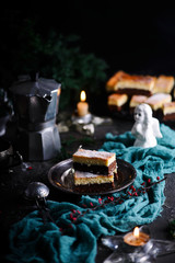 Polish cheesecake on the dark Christmas background.