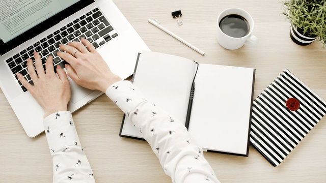 Woman working on laptop. Office work flatlay. Top view desktop. Freelancer and ladyboss concept