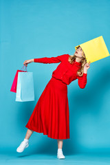 young woman with shopping bags