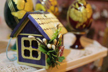 christmas decoration on table a small fairy house with a flower
