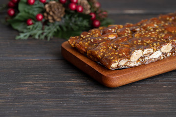 Turron de guirlache, Guirlache nougat made with almond and caramel. Traditional Christmas sweet consumed in Spain.
