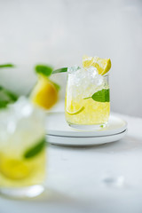 Summer cocktail with sage and lime