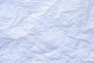 Flat lay, Close-up texture of Crumpled white color tissue paper background abstract. Detail texture of pattern with free space copy for text.