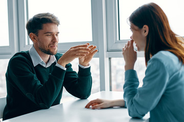 man and woman talking on the phone