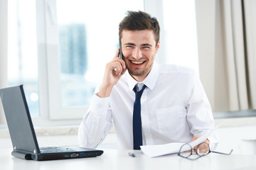 Fototapeta premium portrait of a businessman working on his laptop