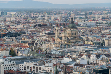 Naklejka premium Aerial view of Budapest Cityscape of St. Stephen's Basilica and the ferris wheel in the center of the city