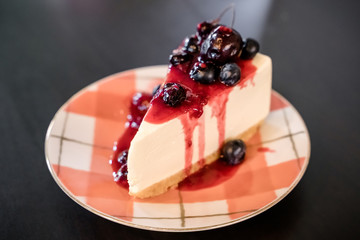 blueberry cheesecake on the table.
