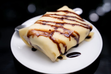 Dessert of banana cold crepe.