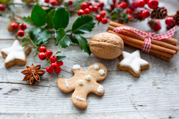 Homemade Christmas gingerbread cookies on wooden background.