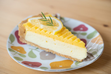 orange cheesecake on the table.