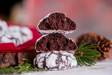 Beautiful tasty homemade cookie in the form of a muzzle of a deer on a wooden tray. Christmas food