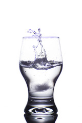 Glass with water isolated on a white background