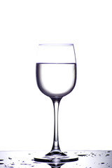 Glass with water isolated on a white background