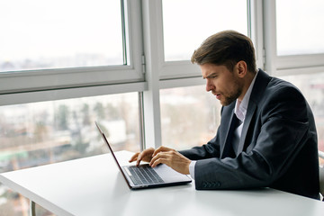 businessman working on laptop in office