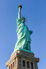 Fototapeta premium Portrait of The Statue of Liberty in New York, USA on a sunny day.