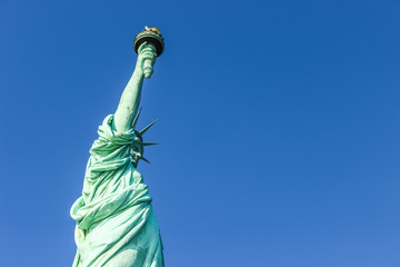 Fototapeta premium Statue of liberty side view with space for text, New York, United States of America