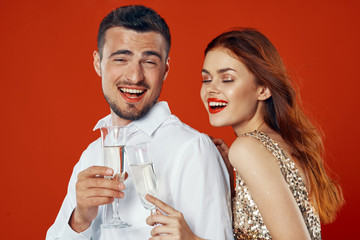 young couple with glass of red wine