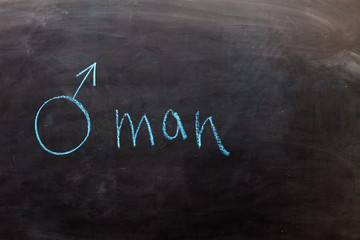 Drawing in blue chalk on the Board of the symbol of Mars the gender symbol of men