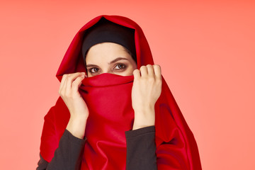 portrait of a woman in red scarf