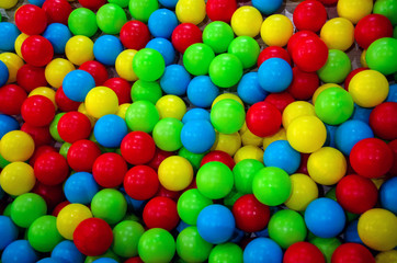 Fototapeta na wymiar multi-colored game balls on the floor