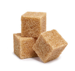 pieces of cane sugar isolate on white