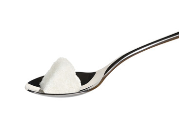 piece of sugar on a teaspoon in the shape of a heart isolated on white