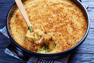 scalloped cheesy Potato and green bean in a dish