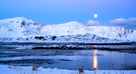 Moonset in Ramberg beach, Norway