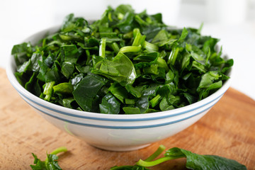 Chopped fresh spinach in a bowl