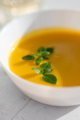 pumpkin soup with herbs. vegan food. 