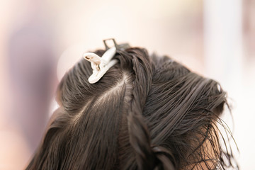 Naklejka premium a woman at the beauty salon