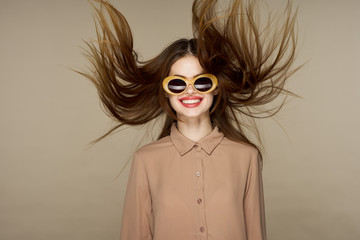 portrait of young woman in sunglasses