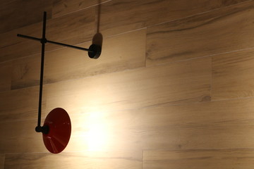 red lamp wooden wall