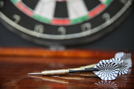 darts on darts board background