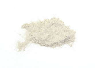Cappuccino powder isolated in white background. Cappuccino with vanilla and cinnamon flavors.