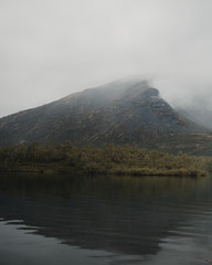 Misty mountain near the lake