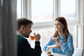 couple having breakfast in the kitchen