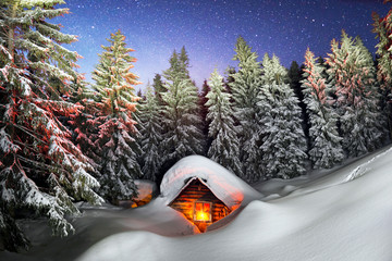 fairy-tale snow-covered house in the mountains