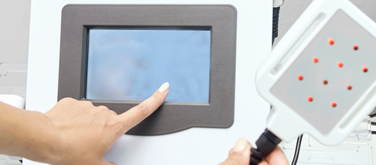 Laser lipo equipment. Cosmetic fat reduce treatment. Woman in medicine salon. Anti cellulite procedure