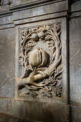 Pomegranate fruit carved in stone, emblem of the city Granada, Spain.