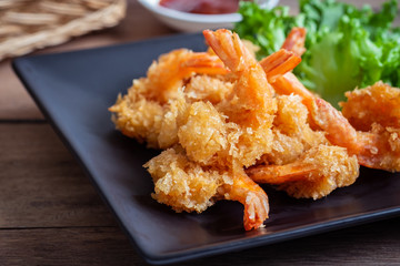 Fried shrimp and vegetable on plate