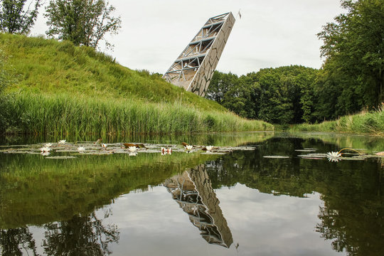 Pompejus watchtower hidden travel spot near the Mozes bridge at Halsteren, the Netherlands. Beautiful reflection in the water.