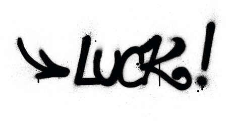 graffiti luck word sprayed in black over white © johnjohnson