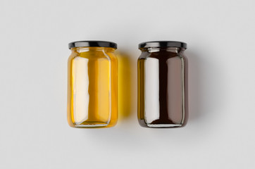 Two honey jars mockup on a grey background.
