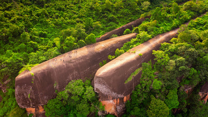 High angle view from unmanned aircraft.  Popular tourist attraction. Three whale stones. Bird eye view shot of three whales rock in Phu Sing Country park in Bungkarn, Thailand. © Thirawatana