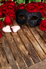 dark red roses on table