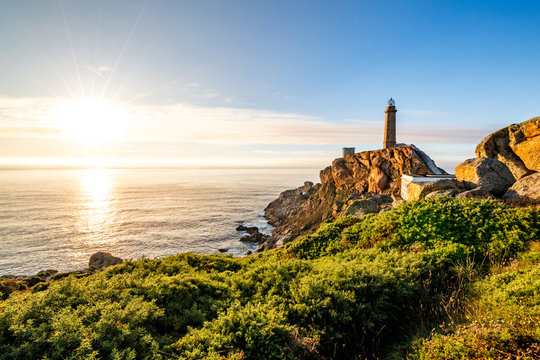 Cape Vilan Lighthouse, Cabo Vilano, in Galicia at sunset, Spain