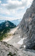 Via ferrata climbing path landscape in Vršič pass in Slovenia, in between Mojstrovka and Prisojnik mountain, nerby famous Hanzova pot rock window in beautiful weather