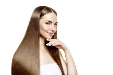 Beautiful model with Healthy Shiny Long Hair. Beauty luxurious hairstyle by stylist in salon hair...