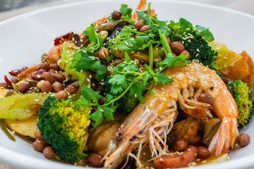 Mala Xiang Guo (mala stir-fry pot). Chongqing Sichuan Spicy Fragrant Pot. Oily, spicy, and numbing Chinese sauce which consists of peppercorn, chili pepper and various spices simmered with oil.